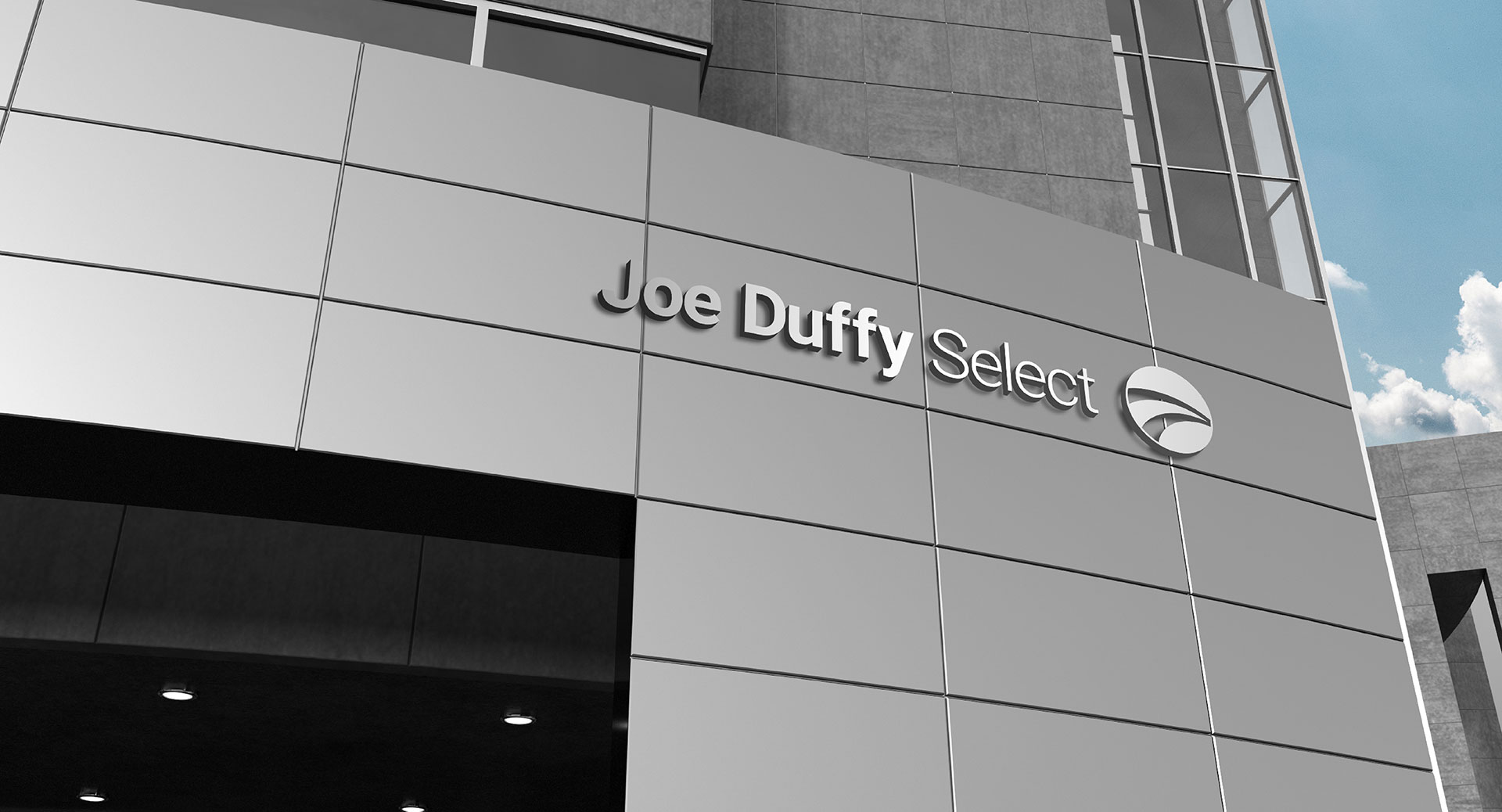 Joe Duffy Group business cards in black and white with the mark