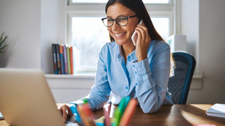 Business owner at a desk, AI search visibility for Irish businesses